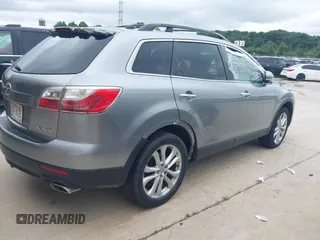 2011 Mazda CX-9 Grand Touring with VIN JM3TB2DA3B0300342, listed as a IAAI auction lot 42588973 with 224,420 mi miles and . Bid and sale history available at DreamBid. Image 4.