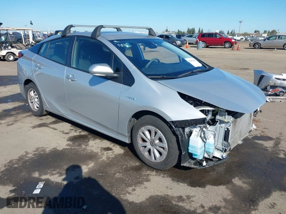 2021 Toyota Prius L Eco with VIN JTDKAMFU5M3130478, listed as a IAAI auction lot 41867606 with 52,223 mi miles. Bid and sale history available at carsss.com. Image 1.
