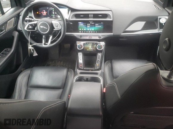 2020 Jaguar I-Pace SE с VIN SADHC2S13L1F85464, выставлен на аукционе Copart как лот 81758543 с пробегом 32 784 миль миль и . История ставок и продаж доступна на DreamBid. Изображение 8.