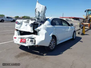 2014 Mitsubishi Lancer ES with VIN JA32U2FU3EU020969, listed as a IAAI auction lot 40337757 with 1 mi miles. Bid and sale history available at carsss.com. Image 4.