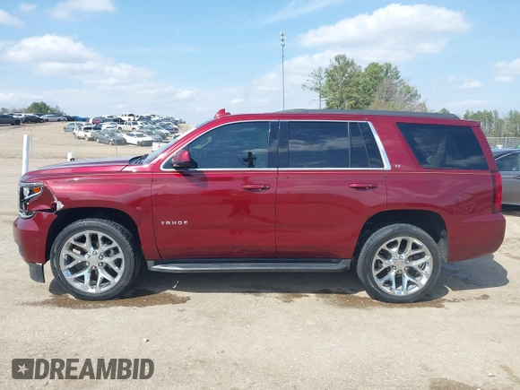 2019 Chevrolet Tahoe LT z VIN 1GNSCBKC9KR102552, wystawiony jako IAAI lot #41792517 z przebiegiem 92 856 mil mil oraz . Historia ofert i sprzedaży dostępna na DreamBid. Obrazek 14.