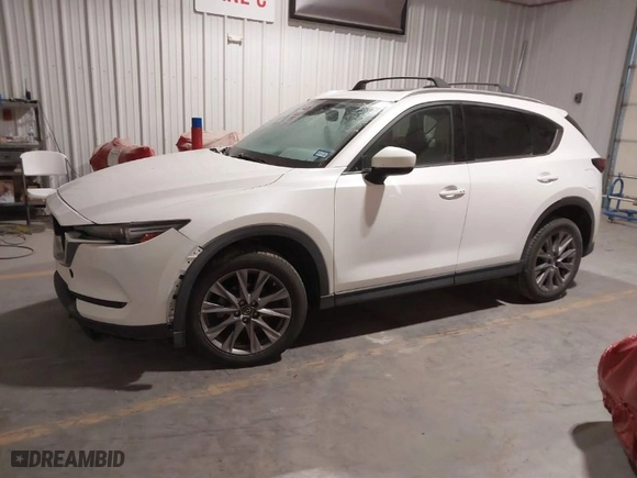 2019 Mazda CX-5 Grand Touring with VIN JM3KFADM7K1563576, listed as a IAAI auction lot 41617026 with NaN miles. Bid and sale history available at carsss.com. Image 2.