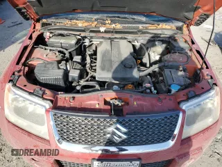 2012 Suzuki Grand Vitara Premium z VIN JS3TD0D65C4100898, wystawiony jako Copart lot #87241744 z przebiegiem Nie podano mil oraz Szkoda całkowita • Salvage title. Historia ofert i sprzedaży dostępna na DreamBid. Obrazek 12.