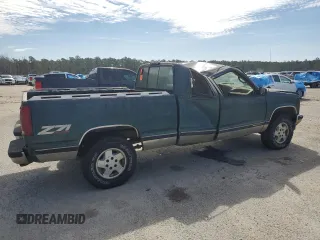 1995 GMC Sierra 1500 z VIN 2GTEK19K1S1561454, wystawiony jako Copart lot #47128465 z przebiegiem 178 963 mil mil oraz Szkody całkowita. Historia ofert i sprzedaży dostępna na DreamBid. Obrazek 3.