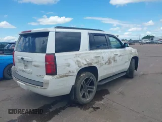 2020 Chevrolet Tahoe LT with VIN 1GNSKBKC6LR256298, listed as a IAAI auction lot 39807928 with Not provided miles and . Bid and sale history available at DreamBid. Image 4.