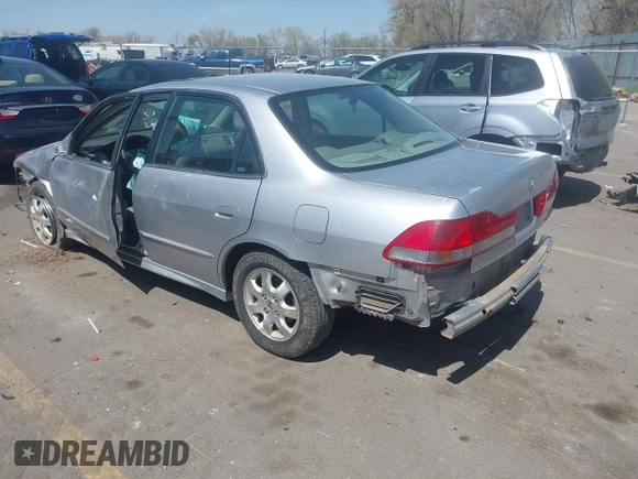2002 Honda Accord EX z VIN JHMCG56612C026303, wystawiony jako IAAI lot #41992812 z przebiegiem 153 021 mil mil oraz . Historia ofert i sprzedaży dostępna na DreamBid. Obrazek 3.