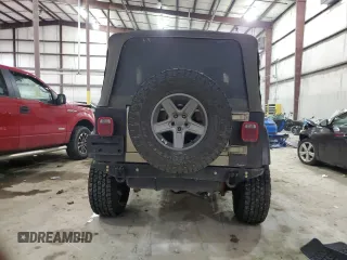 2003 Jeep Wrangler Rubicon z VIN 1J4FA69S13P345591, wystawiony jako Copart lot #41741685 z przebiegiem 85 335 mil mil oraz Szkoda całkowita • Salvage title. Historia ofert i sprzedaży dostępna na DreamBid. Obrazek 6.