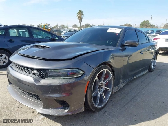 2017 Dodge Charger R/T with VIN 2C3CDXCT3HH635225, listed as a IAAI auction lot 41551772 with 74,024 mi miles. Bid and sale history available at carsss.com. Image 2.
