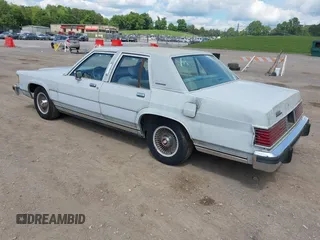 1986 Mercury Grand Marquis z VIN 2MEBP95F2GX642882, wystawiony jako IAAI lot #42227433 z przebiegiem 57 041 mil mil oraz . Historia ofert i sprzedaży dostępna na DreamBid. Obrazek 3.