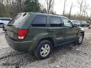 2009 Jeep Grand Cherokee Laredo with VIN 1J8GR48K59C504128, listed as a Copart auction lot 52807835 with 182,053 mi miles and Clean Title. Bid and sale history available at carsss.com. Image 3.