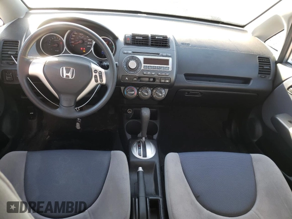 2008 Honda Fit z VIN JHMGD38458S812677, wystawiony jako Copart lot #52879675 z przebiegiem 150 814 mil mil oraz Szkoda całkowita • Salvage title. Historia ofert i sprzedaży dostępna na DreamBid. Obrazek 8.