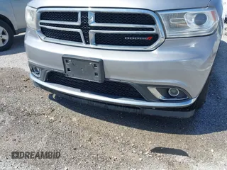 2015 Dodge Durango SXT with VIN 1C4RDJAG2FC114716, listed as a IAAI auction lot 41960920 with 227,497 mi miles and . Bid and sale history available at carsss.com. Image 6.