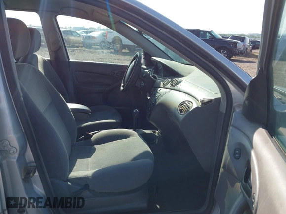 2001 Ford Focus SE z VIN 1FAFP363X1W343475, wystawiony jako IAAI lot #42390133 z przebiegiem 127 282 mil mil oraz . Historia ofert i sprzedaży dostępna na DreamBid. Obrazek 5.