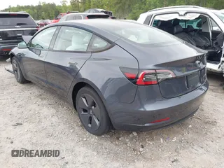 2022 Tesla Model 3 Long Range z VIN 5YJ3E1EB8NF315359, wystawiony jako IAAI lot #42035599 z przebiegiem 54 974 mil mil oraz . Historia ofert i sprzedaży dostępna na DreamBid. Obrazek 3.