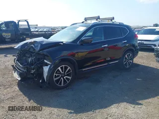 2019 Nissan Rogue SL with VIN 5N1AT2MT1KC833220, listed as a IAAI auction lot 42179936 with 82,232 mi miles and . Bid and sale history available at DreamBid. Image 2.