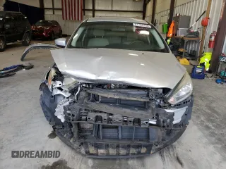 2018 Ford Focus SE z VIN 1FADP3FE9JL234158, wystawiony jako Copart lot #51788755 z przebiegiem 99 877 mil mil oraz Szkoda całkowita • Salvage title. Historia ofert i sprzedaży dostępna na DreamBid. Obrazek 5.