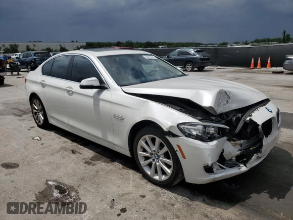 2016 BMW 5 Series 535i xDrive with VIN WBA5B3C56GG254528, listed as a Copart auction lot 56478005 with 141,550 mi miles and Salvage title. Bid and sale history available at DreamBid. Image 4.
