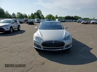 2014 Tesla Model S 60 with VIN 5YJSA1H15EFP51239, listed as a Copart auction lot 59214485 with 153,554 mi miles and Salvage title. Bid and sale history available at DreamBid. Image 13.