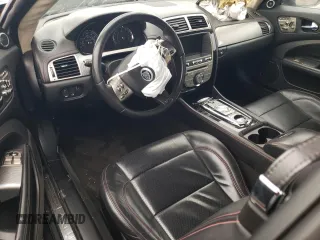 2011 Jaguar XK with VIN SAJWA4EC7BMB42394, listed as a Copart auction lot 83760564 with 67,316 mi miles and Salvage Title. Bid and sale history available at carsss.com. Image 8.