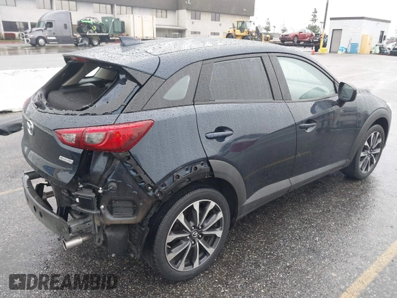 2019 Mazda CX-3 Touring with VIN JM1DKDC79K0424436, listed as a IAAI auction lot 41579280 with 76,989 mi miles. Bid and sale history available at carsss.com. Image 4.