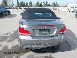 2012 BMW 1 Series 128i with VIN WBAUN1C52CVR00421, listed as a IAAI auction lot 41594256 with 107,957 mi miles and . Bid and sale history available at DreamBid. Image 6.