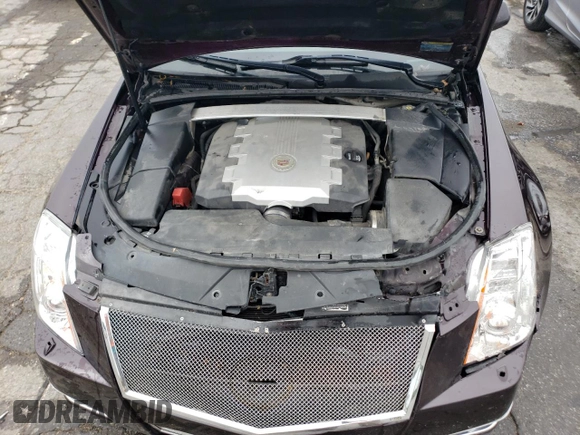 2009 Cadillac CTS RWD with VIN 1G6DV57V490111006, listed as a Copart auction lot 66313174 with 148,467 mi miles and Salvage Title. Bid and sale history available at DreamBid. Image 11.