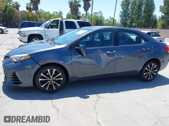 2017 Toyota Corolla L with VIN 5YFBURHE6HP575352, listed as a IAAI auction lot 42417810 with 248,626 mi miles and . Bid and sale history available at DreamBid. Image 6.