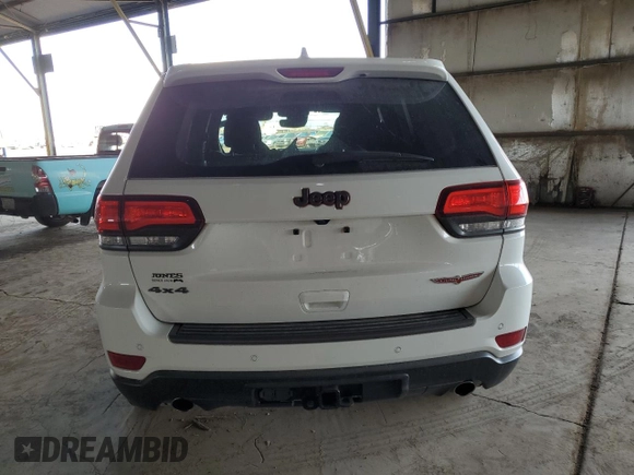 2020 Jeep Grand Cherokee Trailhawk with VIN 1C4RJFLGXLC400313, listed as a Copart auction lot 53649565 with 51,717 mi miles and Salvage title. Bid and sale history available at DreamBid. Image 6.