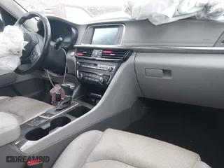 2016 Kia Optima EX with VIN 5XXGU4L30GG120518, listed as a IAAI auction lot 41602190 with 116,268 mi miles. Bid and sale history available at carsss.com. Image 5.