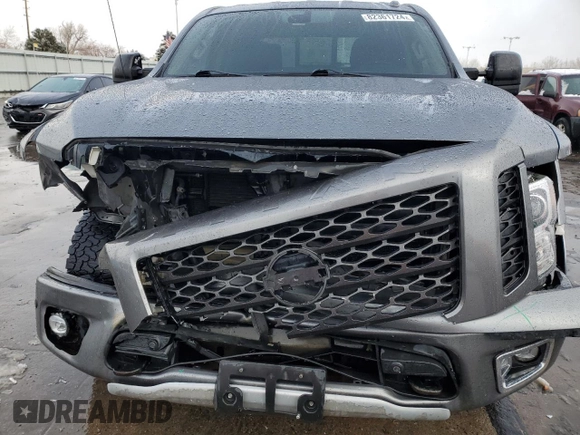 2018 Nissan Titan Pro-4X z VIN 1N6AA1E51JN536680, wystawiony jako Copart lot #82361724 z przebiegiem 98 699 mil mil oraz Szkoda całkowita • Salvage title. Historia ofert i sprzedaży dostępna na DreamBid. Obrazek 5.