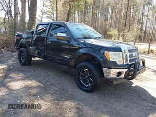 2011 Ford F-150 XLT with VIN 1FTFW1ET8BFA70797, listed as a IAAI auction lot 41909232 with 118,843 mi miles. Bid and sale history available at carsss.com. Image 1.