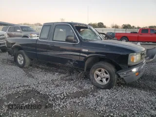 1997 Mazda B-Series 2WD Truck LE with VIN 4F4CR16X1VTM32834, listed as a Copart auction lot 76671504 with 111,851 mi miles and Salvage Title. Bid and sale history available at carsss.com. Image 4.