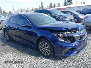 2019 Kia Optima LX z VIN 5XXGT4L38KG372240, wystawiony jako IAAI lot #41648394 z przebiegiem 85 989 mil mil oraz . Historia ofert i sprzedaży dostępna na DreamBid. Obrazek 1.