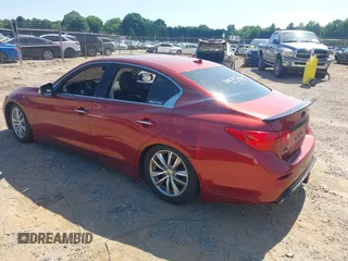 2015 Infiniti Q50 Premium with VIN JN1BV7ARXFM392215, listed as a IAAI auction lot 42449752 with 90,918 mi miles and . Bid and sale history available at DreamBid. Image 3.