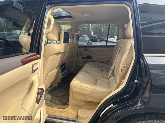 2013 Lexus LX 570 with VIN JTJHY7AX9D4126420, listed as a IAAI auction lot 41794133 with 156,035 mi miles. Bid and sale history available at carsss.com. Image 8.