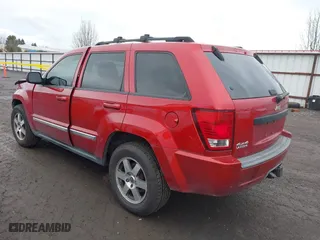 2009 Jeep Grand Cherokee Laredo with VIN 1J8GR48K99C549346, listed as a IAAI auction lot 41870627 with 170,949 mi miles. Bid and sale history available at carsss.com. Image 3.
