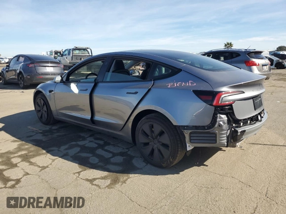 2025 Tesla Model 3 Long Range with VIN 5YJ3E1EA8SF890337, listed as a Copart auction lot 45023425 with 1,765 mi miles and Salvage Title. Bid and sale history available at DreamBid. Image 2.