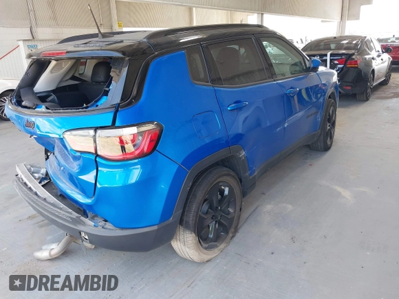 2020 Jeep Compass Altitude with VIN 3C4NJCBB3LT257440, listed as a IAAI auction lot 42115129 with 70,990 mi miles and . Bid and sale history available at carsss.com. Image 4.