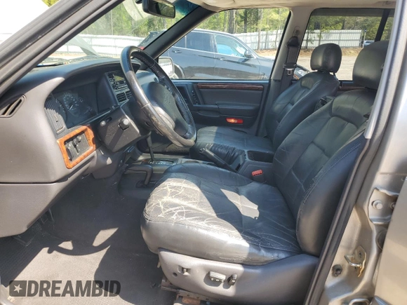 1998 Jeep Grand Cherokee Limited with VIN 1J4GZ78YXWC160346, listed as a Copart auction lot 52595655 with Not provided miles and Salvage title. Bid and sale history available at DreamBid. Image 7.