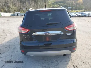 2014 Ford Escape Titanium with VIN 1FMCU9J94EUE57909, listed as a Copart auction lot 51955785 with 154,819 mi miles and Salvage Title. Bid and sale history available at DreamBid. Image 6.