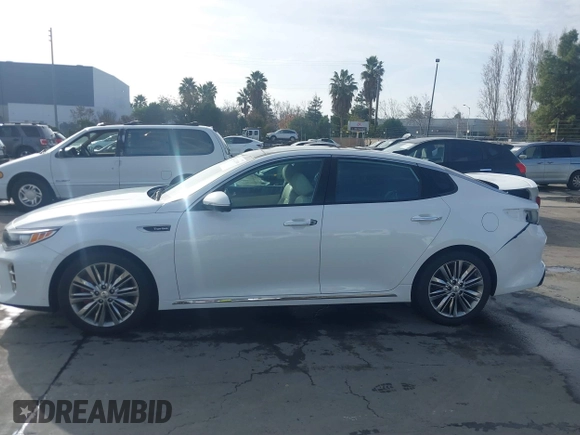 2016 Kia Optima SXL Turbo with VIN 5XXGV4L20GG074869, listed as a IAAI auction lot 41212808 with 82,884 mi miles. Bid and sale history available at carsss.com. Image 15.
