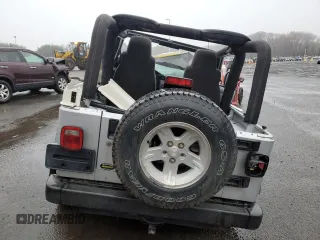 2004 Jeep Wrangler Sport with VIN 1J4FA49S64P767393, listed as a Copart auction lot 51662605 with 165,942 mi miles and Salvage Title. Bid and sale history available at carsss.com. Image 6.