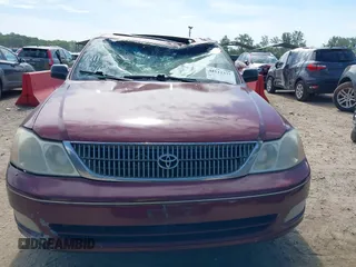 2001 Toyota Avalon XL z VIN 4T1BF28B61U144974, wystawiony jako IAAI lot #42112377 z przebiegiem 168 311 mil mil oraz . Historia ofert i sprzedaży dostępna na DreamBid. Obrazek 13.