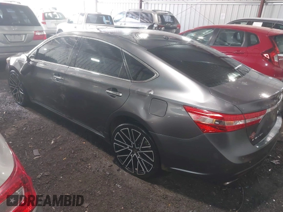 2015 Toyota Avalon Limited with VIN 4T1BK1EB6FU164773, listed as a IAAI auction lot 41877742 with 128,858 mi miles and . Bid and sale history available at DreamBid. Image 3.