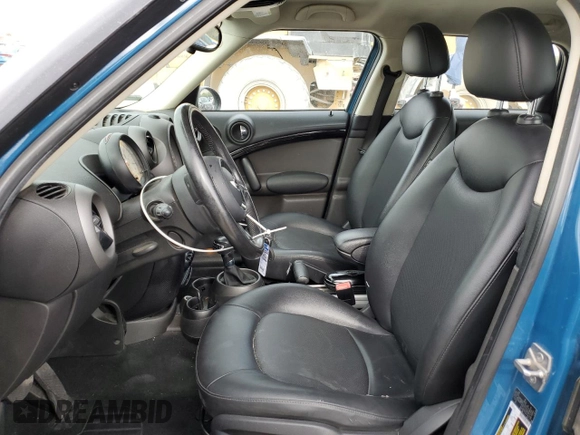 2012 MINI Countryman with VIN WMWZB3C51CWM02831, listed as a Copart auction lot 53821445 with 149,654 mi miles and Salvage Title. Bid and sale history available at DreamBid. Image 7.