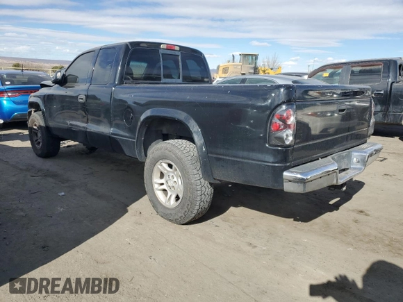 2004 Dodge Dakota SLT with VIN 1D7HG42N44S749267, listed as a Copart auction lot 89313825 with 215,047 mi miles and Salvage Title. Bid and sale history available at carsss.com. Image 2.