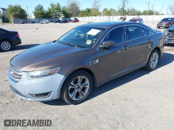 2015 Ford Taurus SEL with VIN 1FAHP2E83FG206055, listed as a IAAI auction lot 41943670 with 90,808 mi miles and . Bid and sale history available at carsss.com. Image 2.