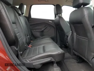 2015 Ford Escape Titanium z VIN 1FMCU9J92FUC37234, wystawiony jako Copart lot #57681855 z przebiegiem 96 973 mil mil oraz Szkoda całkowita • Salvage title. Historia ofert i sprzedaży dostępna na DreamBid. Obrazek 11.