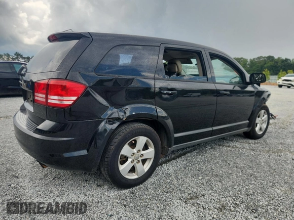 2013 Dodge Journey American Value with VIN 3C4PDCAB4DT650236, listed as a Copart auction lot 62913595 with Not provided miles and Salvage title. Bid and sale history available at DreamBid. Image 3.