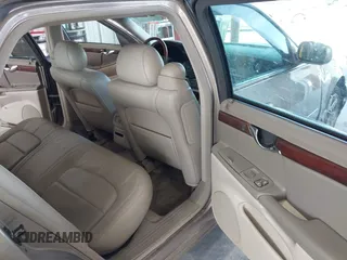 2001 Cadillac DeVille DTS with VIN 1G6KF57911U263913, listed as a IAAI auction lot 41744490 with 100,235 mi miles. Bid and sale history available at carsss.com. Image 8.